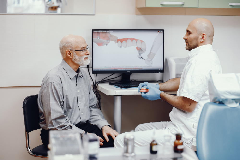 doctor-talking-to-patient-regarding-dental-concerns